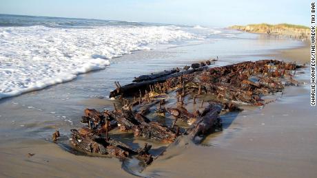 A storm briefly uncovered the wreckage of a ship in Hatteras, North Carolina.