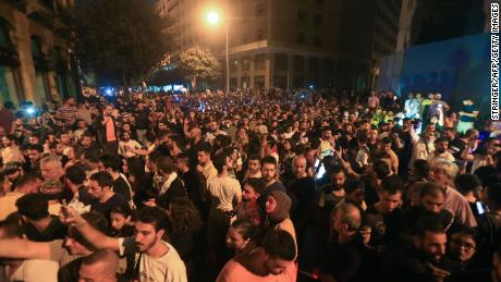 Demonstrators gather outside the government palace in Beirut. 