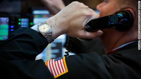 A trader works on the floor of the New York Stock Exchange (NYSE) in New York, U.S., on Friday, April 5, 2019. U.S. stocks climbed toward all-time highs, the dollar strengthened and Treasury yields fell after a report showed the economy is adding jobs with few signs of inflation and President Donald Trump pressured the Federal Reserve to sustain growth. Photographer: Michael Nagle/Bloomberg via Getty Images