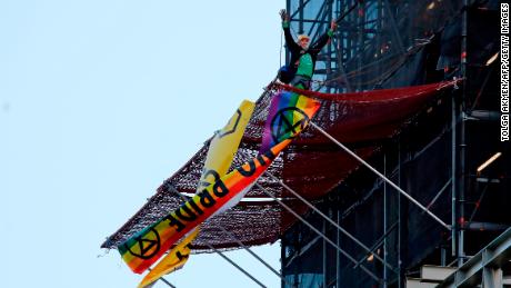 Extinction Rebellion activist climbs Big Ben scaffolding  