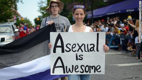 A woman holds a sign during the Queens Pride Parade in New York on June 2, 2013.