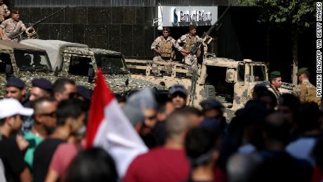 Lebanese soldiers stand guard in Beirut's financial district on October 19, 2019.