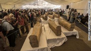 Tourists view the newly discovered coffins at Hatshepsut Temple on October 19, 2019.