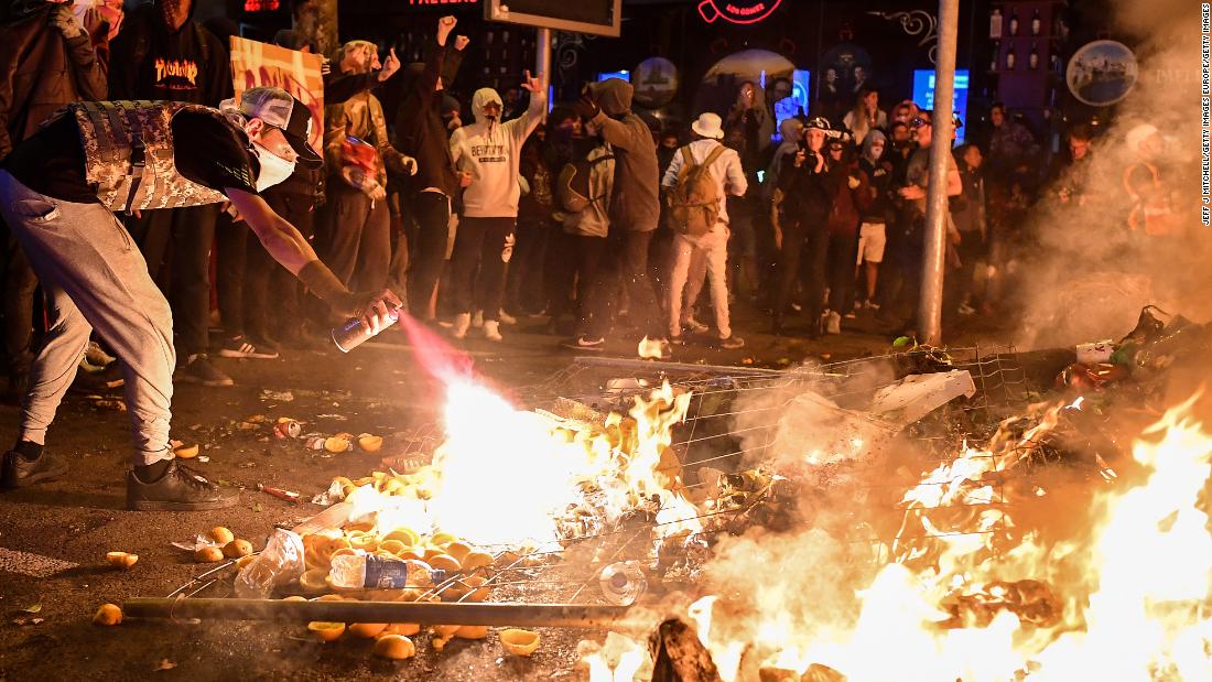 Demonstrators light fires following a week of protests over the jail sentences given to separatist politicians by Spain's Supreme Court, on October 19 in Barcelona.