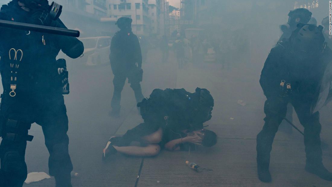 A pro-democracy protester is arrested by police on October 20.