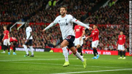 Adam Lallana celebrates scoring Liverpool&#39;s equalizer at Old Trafford.