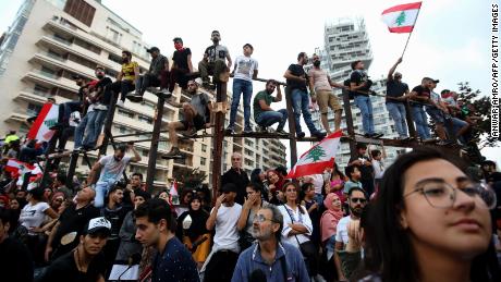 Lebanon &#39;days&#39; away from economic collapse if no political solution to protests found, says central bank governor