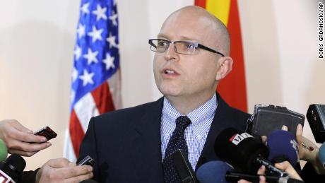 US Deputy Assistant Secretary for European and Eurasian Affairs Philip Reeker, center, talks to media in January 2012. 