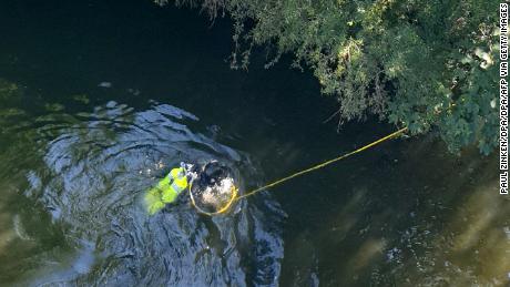 A police diver searches for evidence in the River Spree, close to where Khangoshvili was murdered. 