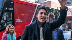 Canadian Prime Minister and Liberal leader Justin Trudeau arrives at the poling station with his son Hadrian, his wife Sophie and daughter Ella-Grace in Montreal, Monday, Oct. 21, 2019. (Paul Chiasson/The Canadian Press via AP)