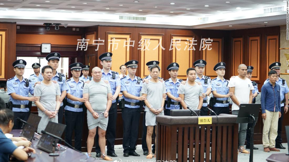 The six men were charged with intentional homicide after staging and outsourcing a murder plot in China's southern Guangxi province.