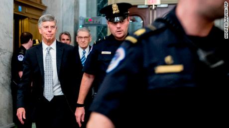 Former Ambassador William Taylor leaves a closed door meeting after testifying as part of the House impeachment inquiry on Capitol Hill on October 22.