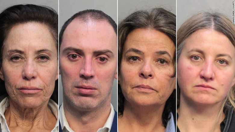 Four American Airlines flight attendants were arrested at Miami International Airport for money laundering during a routine customs check on Monday, Oct. 21, according to a police report from Miami-Dade police.