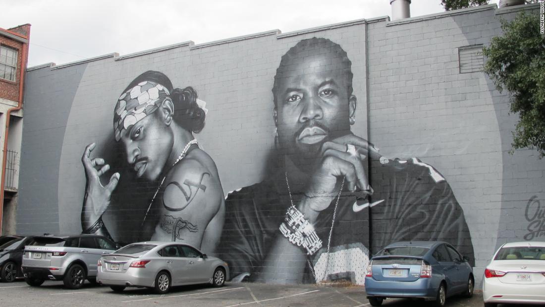 A mural of OutKast in Atlanta&#39;s Little Five Points neighborhood has attracted crowds of people coming to see the iconic duo. 