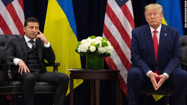 TOPSHOT - US President Donald Trump and Ukrainian President Volodymyr Zelensky looks on during a meeting in New York on September 25, 2019, on the sidelines of the United Nations General Assembly. (Photo by SAUL LOEB / AFP) (Photo by SAUL LOEB/AFP via Getty Images)