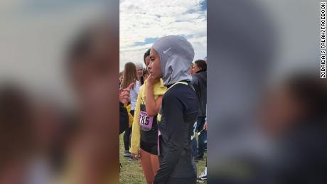 A high school athlete ran her personal best but was disqualified for her hijab