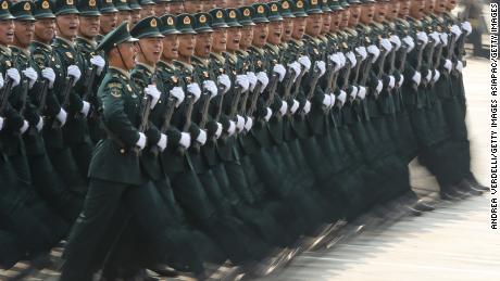 Soldiers of the People&#39;s Liberation Army march during a parade to celebrate the 70th anniversary of the founding of the People&#39;s Republic of China in 1949, at Tiananmen Square on October 1, 2019.