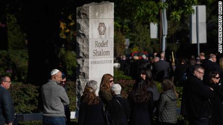  Mourners waited outside Rodef Shalom Temple awaiting the visitation and funeral of brothers Cecil Rosenthal, 59, and David Rosenthal, 54 on October 30, 2018 in Pittsburgh, Pennsylvania. 