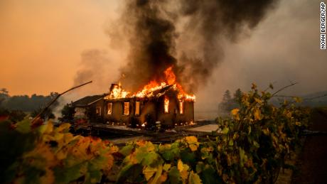 The Kincade Fire burns through a community of unincorporated Sonoma County, Calif. 