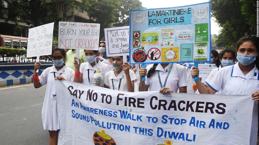 School students take part in a rally against fire cracker pollution in Kolkata on October 22, 2019.