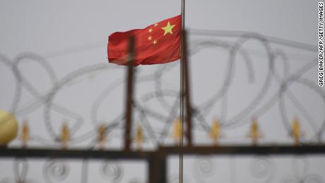The Chinese flag at a housing compound in Yangisar, in China&#39;s western Xinjiang region. 