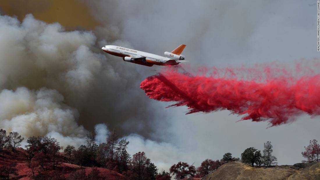 A firefighting aircraft intervenes over Sonoma County, California, where the Kincade Fire was burning on October 25.