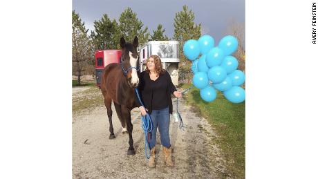 Avery Feinstein with her horse Rudy before she underwent bariatric surgery. Rudy has been by Feinstein's side during her weight loss journey.