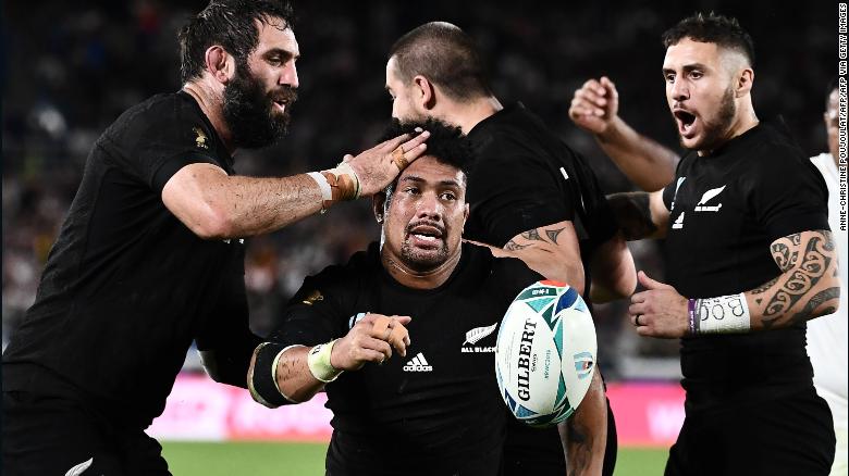 New Zealand&#39;s flanker Ardie Savea is congratulated by teammates after scoring his second half try which briefly boosted the All Blacks. 