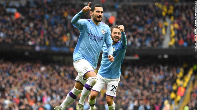 Ilkay Gundogan of Manchester City celebrates after scoring his team's final goal in the 3-0 Premier League win over Aston Villa.