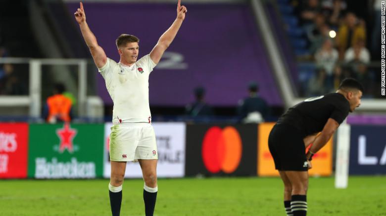 Owen Farrell celebrates after England score a try.