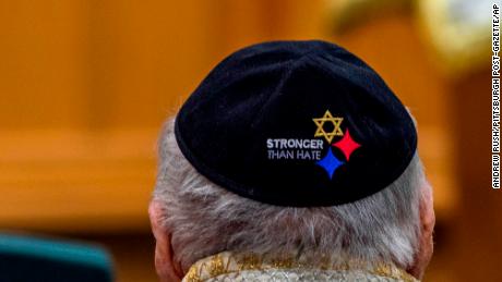 Yarmulkes embroidered with a version of the Pittsburgh Steelers logo are worn at the service.