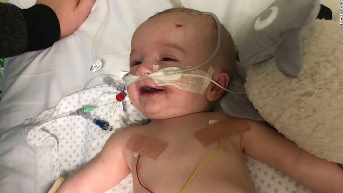 When 14-week-old baby Michael woke up from a medically induced coma, he recognized his dad and flashed an adorable smile. 