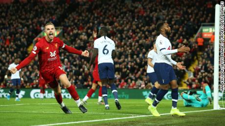 Jordan Henderson celebrates his first goal at Anfield since 2015. 