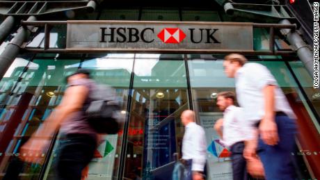 Pedestrians walk past a HSBC UK bank branch in central London on July 31, 2018. - HSBC will publish their half-year results on August 6. (Photo by Tolga Akmen / AFP)        (Photo credit should read TOLGA AKMEN/AFP/Getty Images)