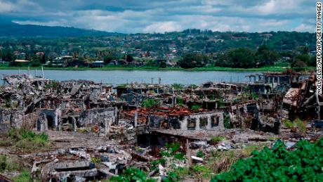 A general view shows destroyed buildings in Marawi on the southern island of Mindanao on May 23, 2019. Two years after the Philippine city of Marawi was overrun by jihadists it remains in ruins, with experts warning that stalled reconstruction efforts are bolstering the appeal of extremist groups in the volatile region.