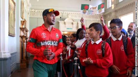 Schoolchildren in the Pavilion at Lord&#39;s with Bangladesh&#39;s Shakib Al Hasan on July 5, 2019 in London.