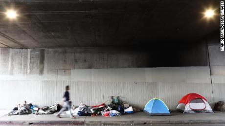 A homeless encampment under an overpass in Los Angeles.