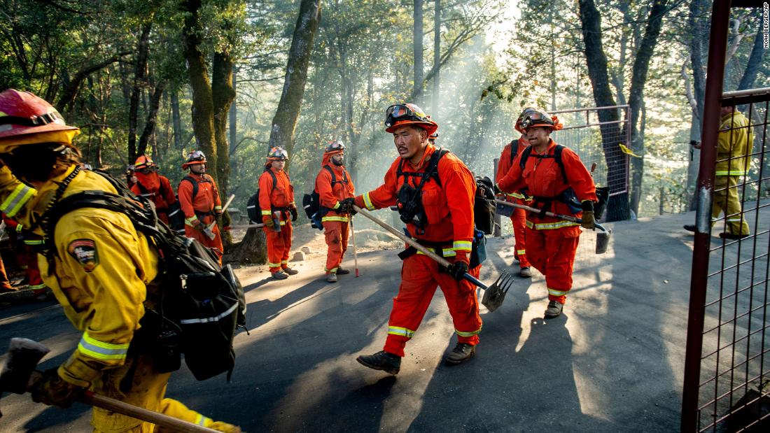 Inmate firefighters battle the Kincade Fire near Healdsburg, California, on Tuesday, October 29.