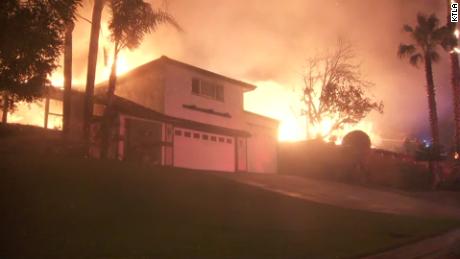 California wildfires: Homes burn in San Bernardino and strong winds threaten to stoke other blazes