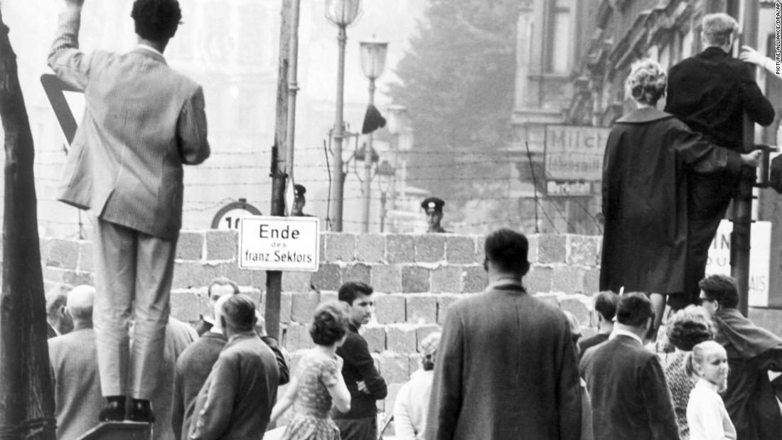 West Berliners wave at relatives in the East, September 1961. 
