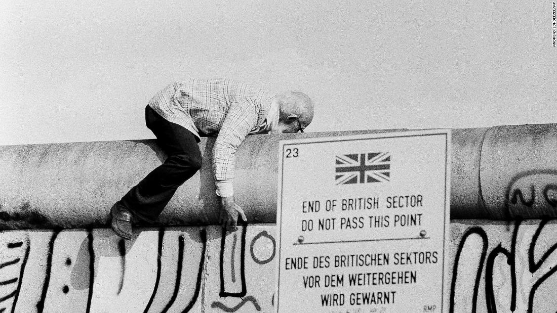 Canadian-American peace activist John Runnings, then aged 68, walked along a section of the Wall in 1986, as a form of non-violent protest. 