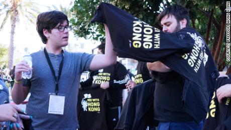 Protesters hand out free shirts outside BlizzCon, in Anaheim, California, on Friday.