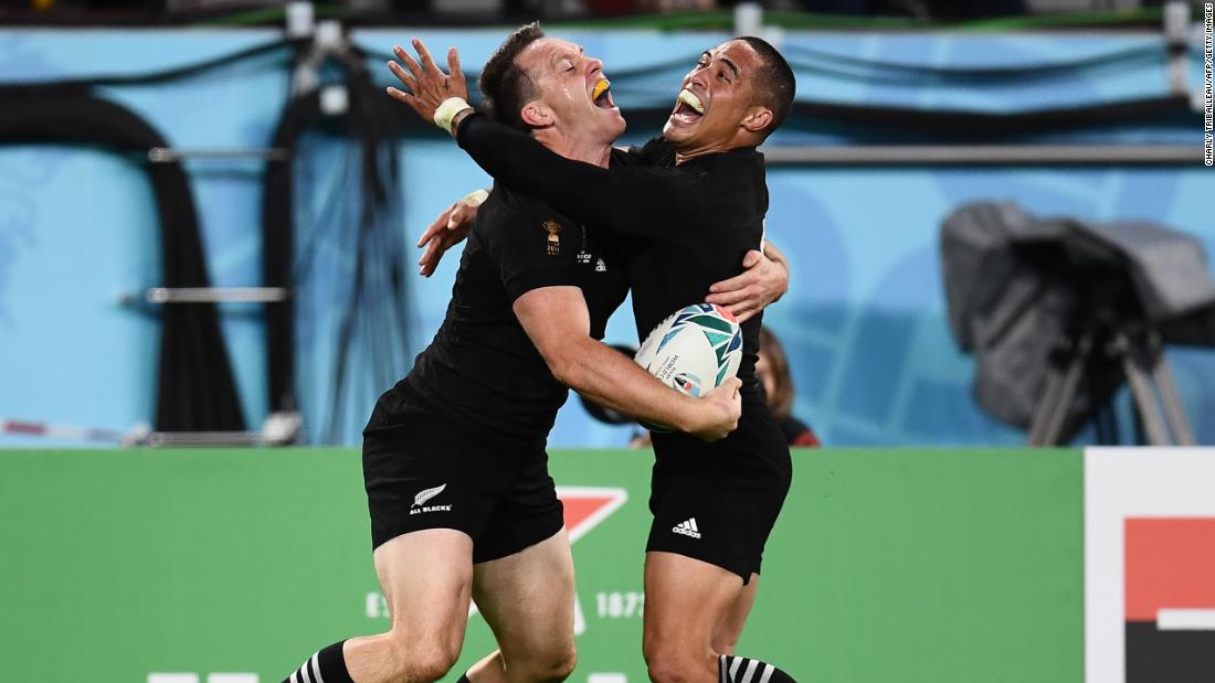 New Zealand&#39;s wing Ben Smith (L)  celebrates with scrumhalf Aaron Smith after scoring a try  during the Japan 2019 Rugby World Cup bronze final match against Wales. The All Blacks ran out comfortable 40-17 winners.