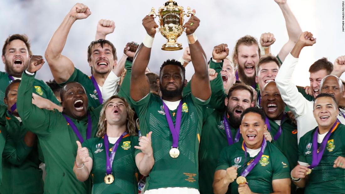 South Africa&#39;s Siya Kolisi celebrates with the Webb Ellis trophy after the Springboks&#39; Rugby World Cup final victory over England.