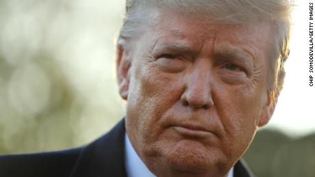 President Donald Trump talks to reporters before departing the White House, November 1.