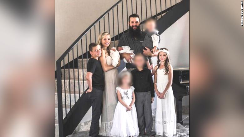 This photo shows Howard Jackob Miller, Jr., Rhonita Maria Miller, infant twins Titus Alvin Miller and Tiana Griciel Miller, and Krystal Bellaine Miller, who all died in the attack. Howard Miller, the adult male pictured, is alive and was not present at the attack. 