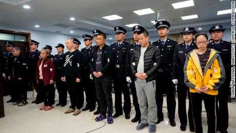 The defendants in Thursday&#39;s court case in Hebei, who were accused of being part of a fentanyl smuggling ring.