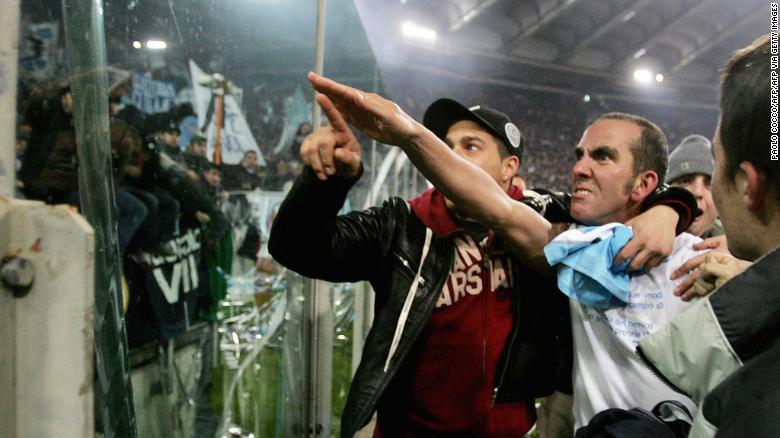 Lazio&#39;s forward Paolo Di Canio gesturing towards Lazio fans.