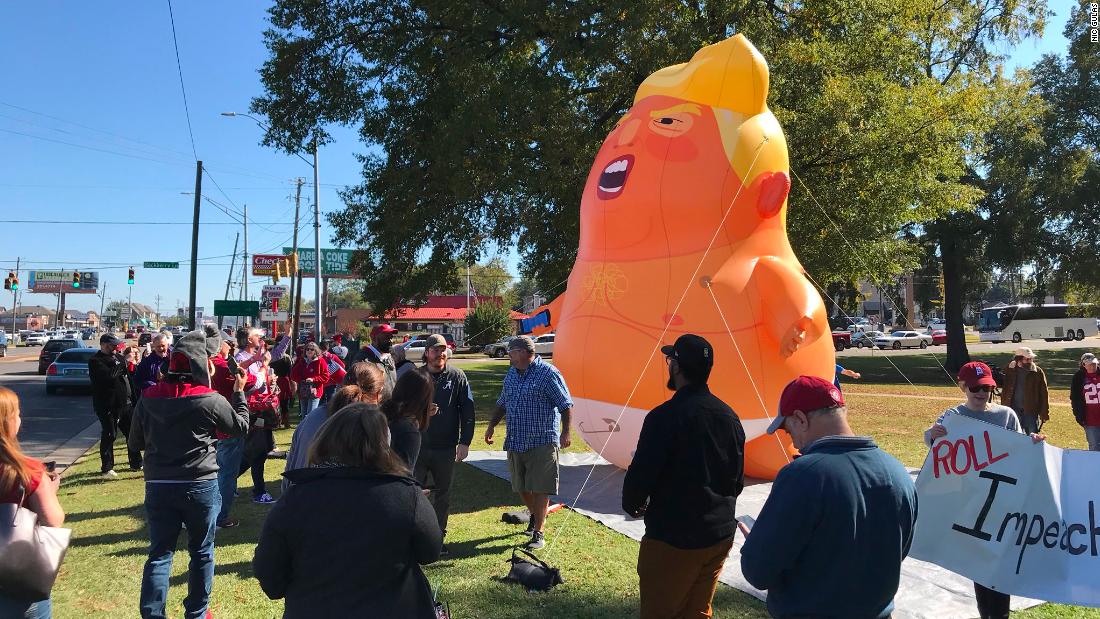 'Baby Trump' balloon slashed and deflated after drawing protesters ahead of Alabama-LSU football game