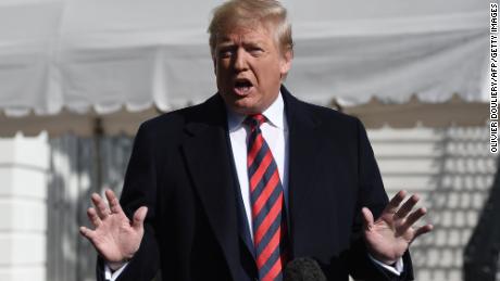 US President Donald Trump speaks to members of the media on the South Lawn of the White House in Washington DC as he departs for Tuscaloosa, Alabama on November 9, 2019. - Trump and First Lady Melania are attending the Louisiana State University Tigers vs. Alabama Crimson Tide Football Game. (Photo by Olivier Douliery / AFP) (Photo by OLIVIER DOULIERY/AFP via Getty Images)